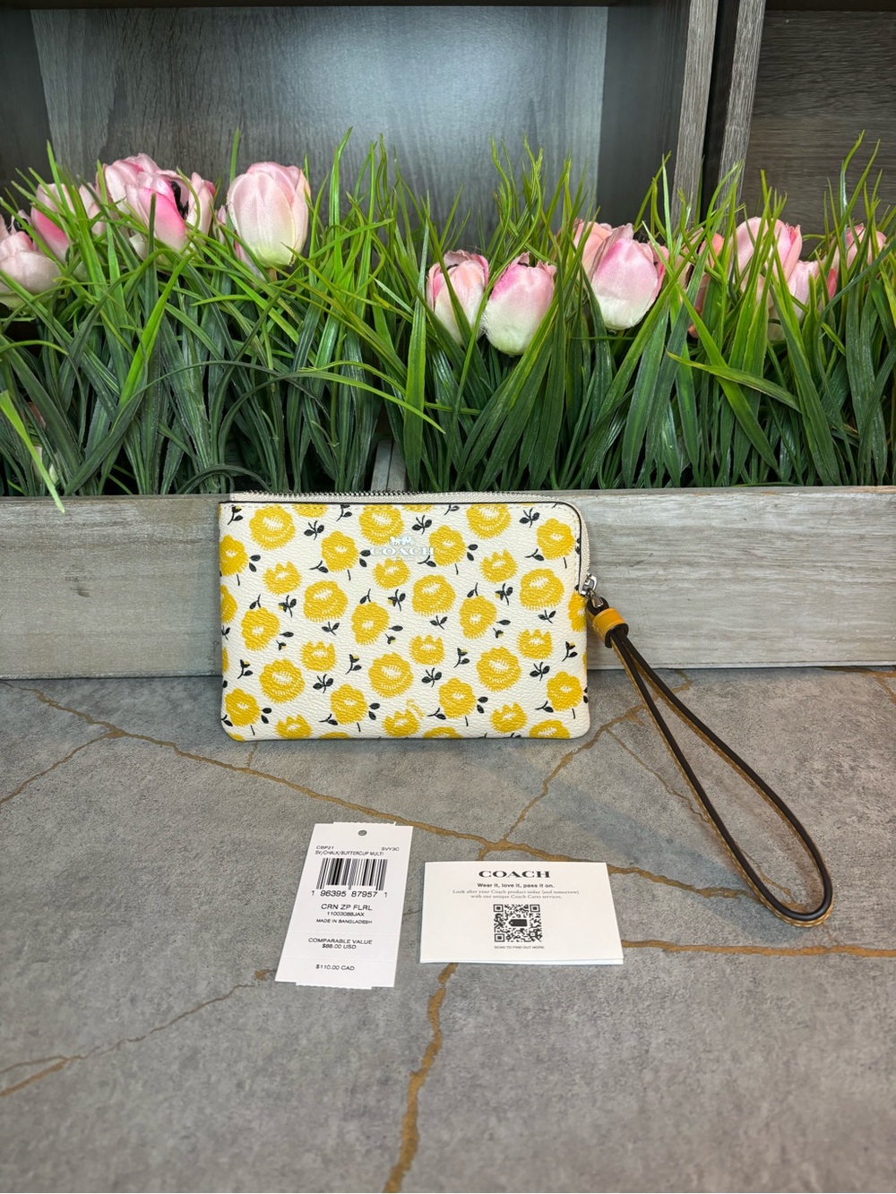 COACH NWT Yellow Floral Wristlet Pouch with Brown Strap